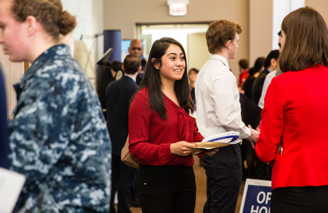 a student professionally dressed at a Job Fair